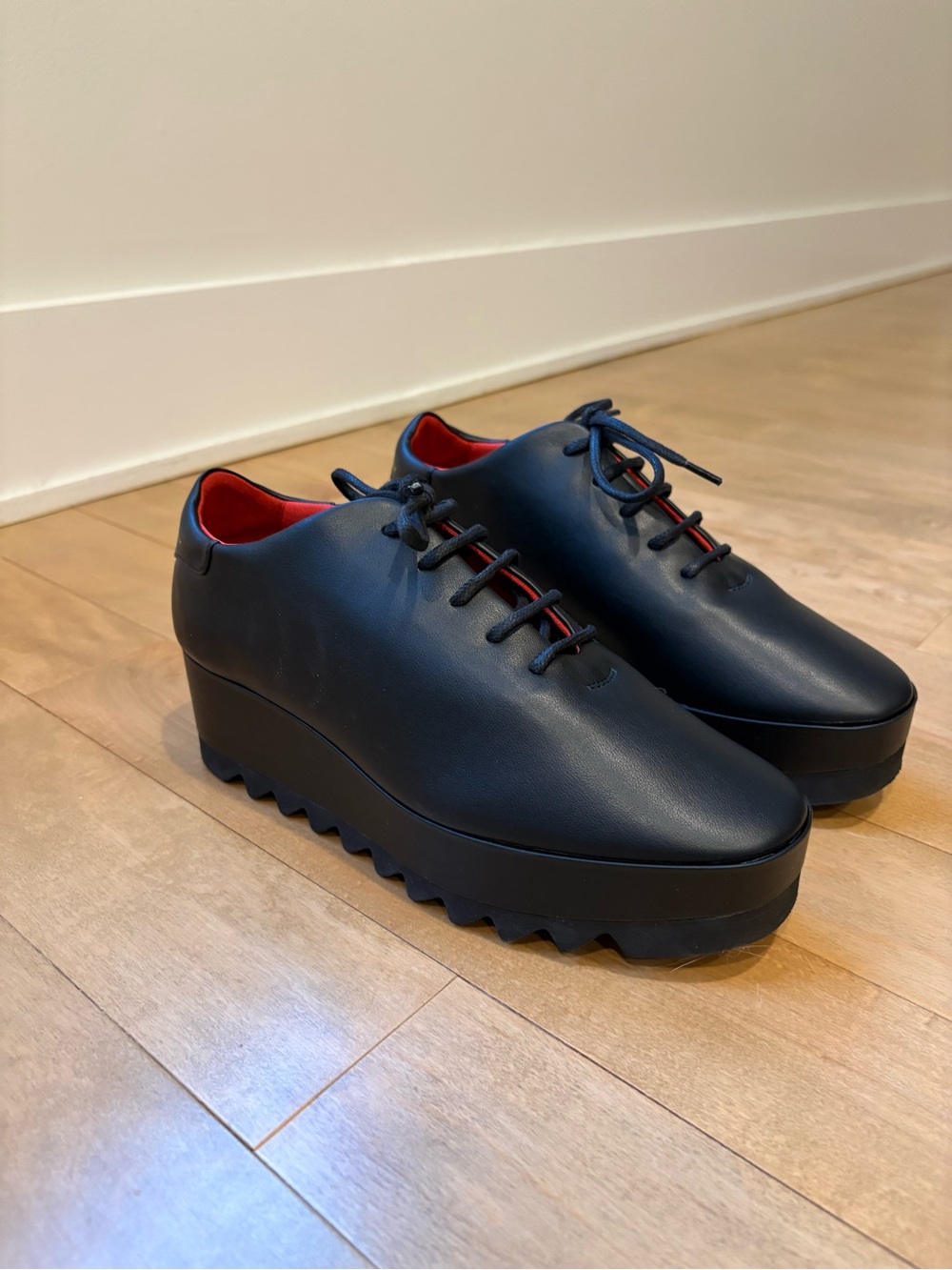 Stella McCartney Black Platform Lace-Up Sneakers with Red Interior